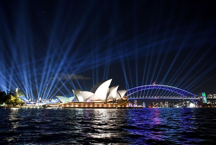 SYDNEY, AUSTRALIA - MAY 27: Light installations near the Sydney Harbour Bridge for the opening of the Vivid Sydney festival on May 27, 2022 in Sydney, Australia. The annual Vivid Sydney festival has officially started, transforming the famous Harbour City into an illuminating fusion of creativity, innovation and technology. Celebrating the essence of Sydney, including its First Nations culture, diversity, beauty, resilience, and vibrant creative community, more than 200 events will be staged throughout Sydney and its surrounds during what is Australias largest event from Friday 27 May to Saturday 18 June. Highlights of the 23-day festival include an 8-kilometre continuous Light Walk stretching from Sydney Opera House to Central Station and the Southern Hemispheres largest-ever drone show from Paramount+. (Photo by James D. Morgan/Getty Images for Destination New South Wales)