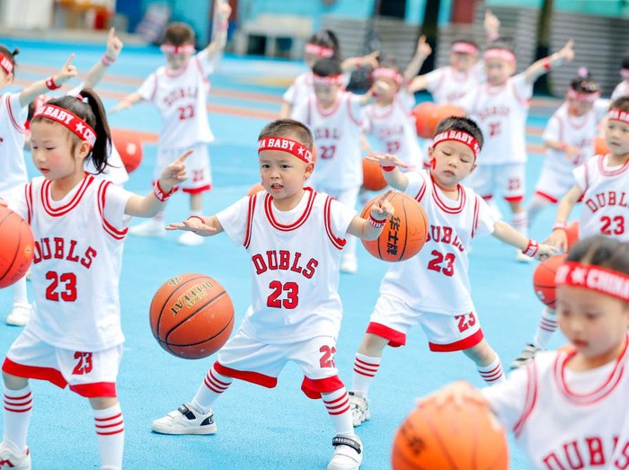 XIAJIANG, CHINA - MAY 27: Children play basketball to welcome the upcoming International Childrens Day at a kindergarten on May 27, 2022 in Xiajiang County, Ji an City, Jiangxi Province of China. (Photo by Chen Fuping/VCG via Getty Images)
