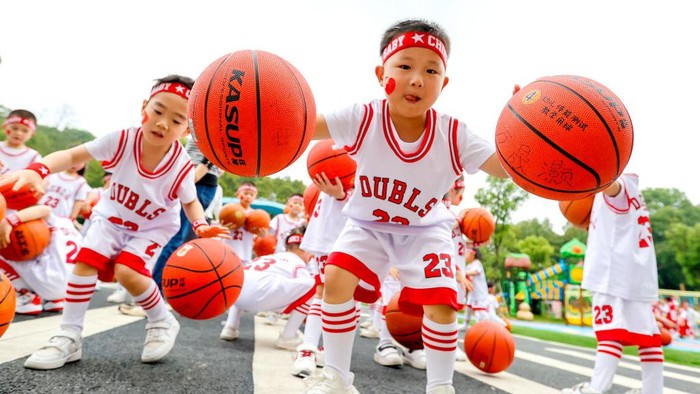 XIAJIANG, CHINA - MAY 27: Children play basketball to welcome the upcoming International Children's Day at a kindergarten on May 27, 2022 in Xiajiang County, Ji an City, Jiangxi Province of China. (Photo by Chen Fuping/VCG via Getty Images)