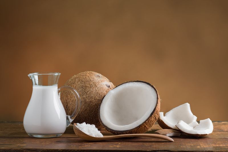 Coconut Milk with fresh coconut for alternative therapy, spa theme