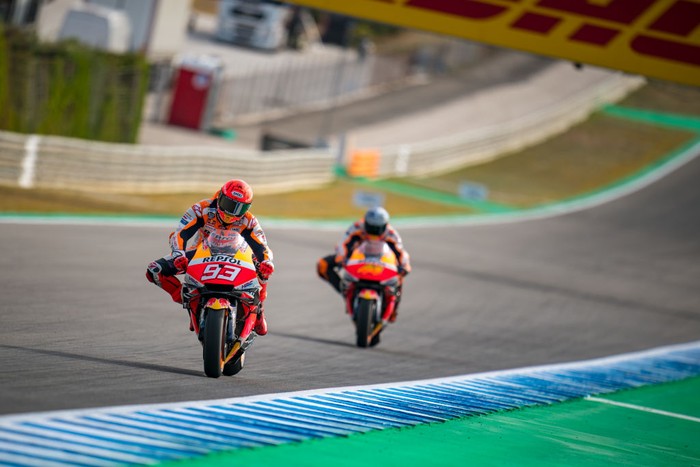 LOMBOK, INDONESIA - FEBRUARY 10: Marc Marquez of Spain and Repsol Honda Team and Pol Espargaro of Spain and Repsol Honda Team ride scooters around the circuit during the MotoGP Pre-Season IRTA-Test at Mandalika International Street Circuit on February 10, 2022 in Lombok, Indonesia. (Photo by Steve Wobser/Getty Images)