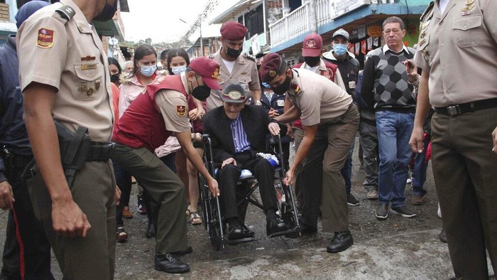 Juan Vicente Pérez Mora, who is listed by Guinness World Records as the oldest living male in the world, attends a Mass as part of celebration of his 113th birthday in San Jose De Bolivar in Tachira State in Venezuela, Friday, May 27, 2022. (AP Photo/Gilberto Chacon)
