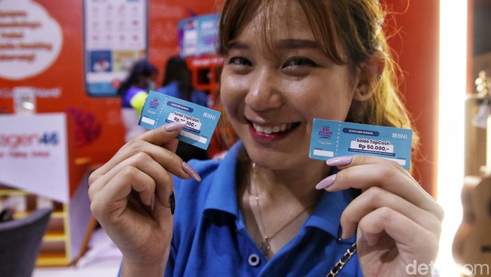 Asyik! Buka Rekening-Isi TapCash Bisa di BNI Java Jazz Festival 2022 Sejumlah fasilitas tersedia di booth BNI yang ada di BNI Java Jazz Festival 2022. Di booth itu pengunjung bisa buka rekening, main games, hingga isi TapCash BNI