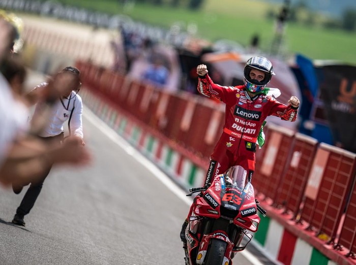 SCARPERIA, ITALY - MAY 29: Francesco Bagnaia of Italy and Ducati Lenovo Team stands on his bike during he rolls through the pitlane after the race of the MotoGP Gran Premio d’Italia Oakley at Mugello Circuit on May 29, 2022 in Scarperia, Italy. (Photo by Steve Wobser/Getty Images)
