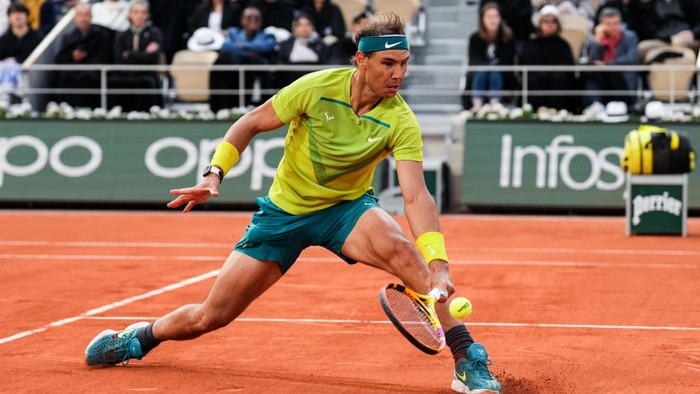 PARIS, FRANCE - MAY 29: Rafael Nadal of Spain plays a backhand in the Mens Singles Fourth Round match against Felix Auger-Aliassime of Canada during Day Eight of The 2022 French Open at Roland Garros on May 29, 2022 in Paris, France. (Photo by Shi Tang/Getty Images)