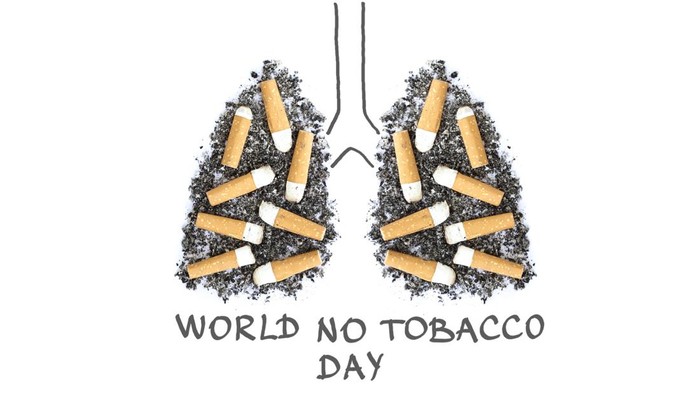 Cigarette butts in pulmonary contour and text world no tobacco day on white background