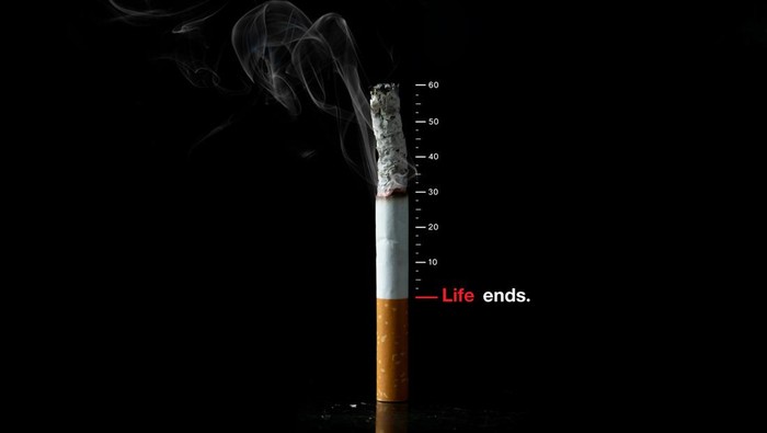 World No Tobacco Day Concept. Stop Smoking. Tobacco cigarette butts With the level bar represent the level of life caused by smoking. health concept The more you smoke, the worse your health and life.