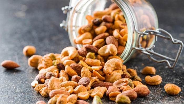 Spicy flavoured nuts. Mix of nuts in jar.