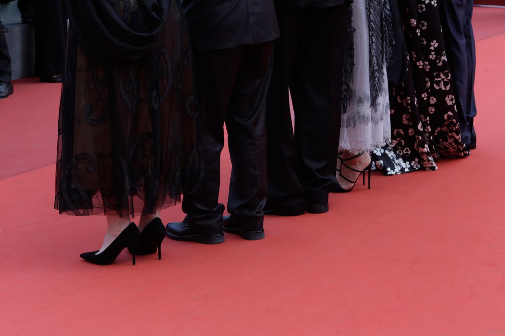 CANNES, FRANCE - MAY 25: Shoe details of Sabrina S. Sutherland, Patrice Forest of Idem Paris, director Director David Lynch, Actor Kyle MacLachlan and Desiree Gruber during the 