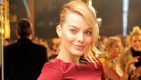 Perjalanan karier Margot Robbie cukup panjang di dunia hiburan. Ia memulai kariernya di dunia film sejak 2008. Foto: WireImage/Dave M. Benett