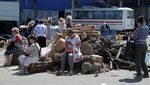 Wajah-wajah Lesu di Kota Mariupol yang Dikuasai Rusia