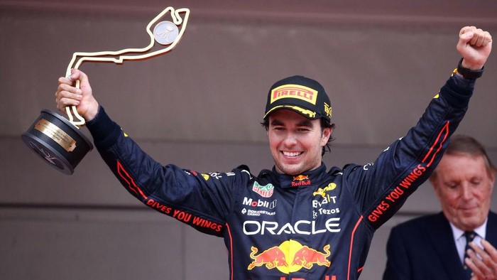 MONTE-CARLO, MONACO - 2022/05/29: Sergio Perez of Red Bull Racing  celebrates on the podium after winning  the F1 Grand Prix of Monaco. (Photo by Marco Canoniero/LightRocket via Getty Images)