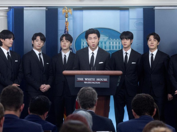 Kim Namjoon of the K-Pop band BTS and fellow members, (not in order), Kim Taehyung, Kim Seokjin, Jeon Jeongguk, Park Jimin, Jung Hoseok and Min Yoon-gi make statements against anti-Asian hate crimes and for inclusion and representation during the daily briefing at the White House in Washington, U.S., May 31, 2022. REUTERS/Leah Millis
