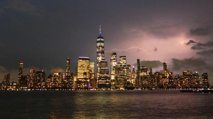 HOBOKEN, NJ - MAY 27: A thunderstorm moves across midtown Manhattan in New York City on May 27, 2022, as seen from Hoboken, New Jersey.  (Photo by Gary Hershorn/Getty Images)