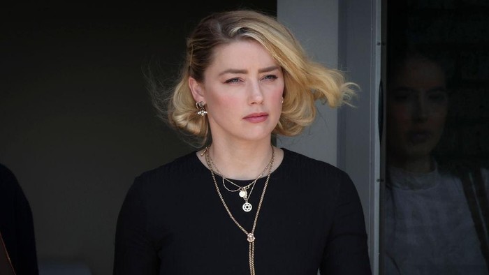 Amber Heard FAIRFAX, VA - JUNE 01: Actress Amber Heard departs the Fairfax County Courthouse on Wednesday, June 1, 2022 in Fairfax, VA. The jury in the Depp vs. Heard case awarded actor Johnny Depp $15 million in his defamation case against Heard. (Kent Nishimura / Los Angeles Times via Getty Images)