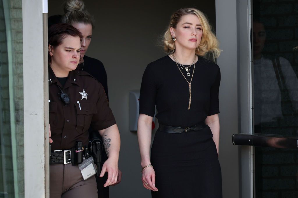 FAIRFAX, VA - JUNE 01: Actress Amber Heard departs the Fairfax County Courthouse on Wednesday, June 1, 2022 in Fairfax, VA. The jury in the Depp vs. Heard case awarded actor Johnny Depp $15 million in his defamation case against Heard. (Kent Nishimura / Los Angeles Times via Getty Images)