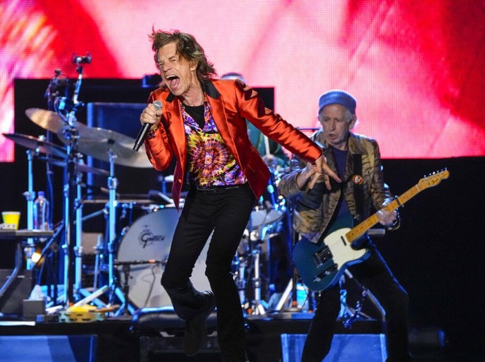 Mick Jagger, centre, Ronnie Wood, left, and Keith Richards, right, of the band the Rolling Stones, performs during their Sixty Stones Europe 2022 tour at the Wanda Metropolitano stadium in Madrid, Spain, Wednesday, June 1, 2022. (AP Photo/Manu Fernandez)
