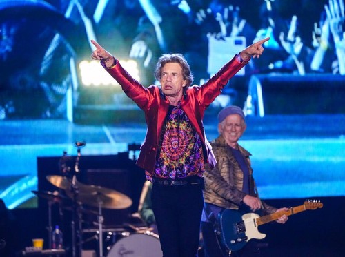 Mick Jagger, centre, Ronnie Wood, left, and Keith Richards, right, of the band the Rolling Stones, performs during their Sixty Stones Europe 2022 tour at the Wanda Metropolitano stadium in Madrid, Spain, Wednesday, June 1, 2022. (AP Photo/Manu Fernandez)