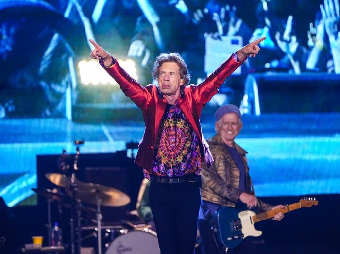 Mick Jagger, centre, Ronnie Wood, left, and Keith Richards, right, of the band the Rolling Stones, performs during their Sixty Stones Europe 2022 tour at the Wanda Metropolitano stadium in Madrid, Spain, Wednesday, June 1, 2022. (AP Photo/Manu Fernandez)
