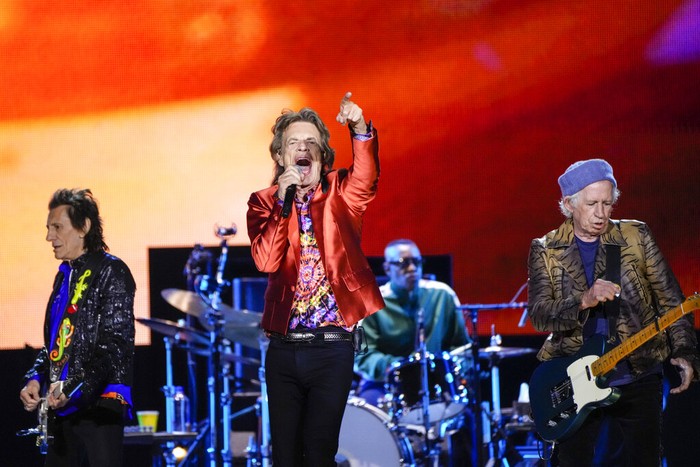 Mick Jagger, centre, Ronnie Wood, left, and Keith Richards, right, of the band the Rolling Stones, performs during their Sixty Stones Europe 2022 tour at the Wanda Metropolitano stadium in Madrid, Spain, Wednesday, June 1, 2022. (AP Photo/Manu Fernandez)