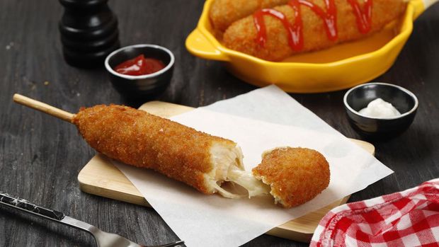 Mozarella Corndog with Tomato Sauce, Popular Korean and American Street Food, on Wooden Table