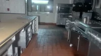 Bagian dapur ini masih berisi banyak alat masak. Semuanya tampak dibiarkan begitu saja.