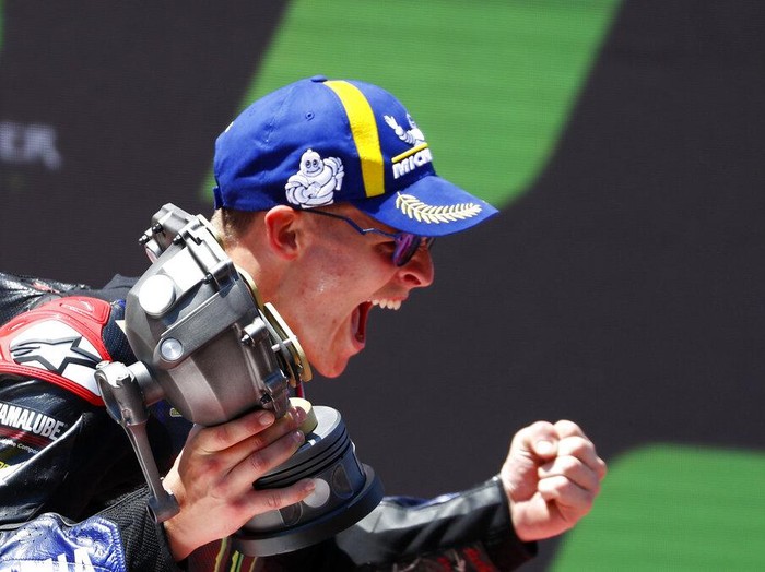 Frances rider Fabio Quartararo of the Monster Energy Yamaha MotoGP celebrates his victory in the MotoGP race of the Catalunya Motorcycle Grand Prix at the Catalunya racetrack in Montmelo, just outside of Barcelona, Spain, Sunday, June 5, 2022. (AP Photo/Joan Monfort)