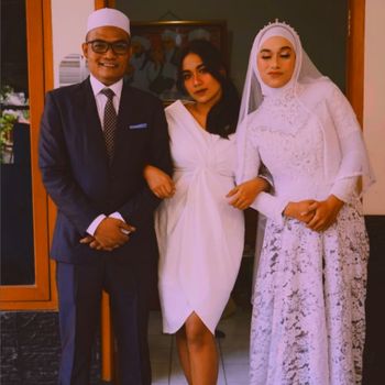 Foto pasangan suami istri, Kurniati dan Bimo viral di media sosial.