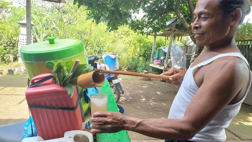 Salah satu penjual tuak manis, Ketut Nuryasta asal Desa Bungkulan, Kecamatan Sawan, Kabupaten Buleleng.