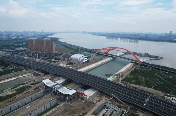 Beijing-Hangzhou Grand Canal HANGZHOU, CHINA - JUNE 6, 2022 - An aerial view of the Babao Ship lock, a key control project of the Beijing-Hangzhou Grand Canal, in Hangzhou, East China's Zhejiang Province, June 6, 2022. Eight fort lock is the beijing-hangzhou grand canal two channel connecting terminal of the qiantang river, a category double lock, lock chamber effective length of 300 meters, 23 meters water depth, 4.2 meters wide, the project covers waterway, highway, water conservancy, municipal, housing, electromechanical and landscape, etc, after the completion of thousand tons ship from shandong to hangzhou, one-way capacity can reach 42 million tons. (Photo credit should read CFOTO/Future Publishing via Getty Images)