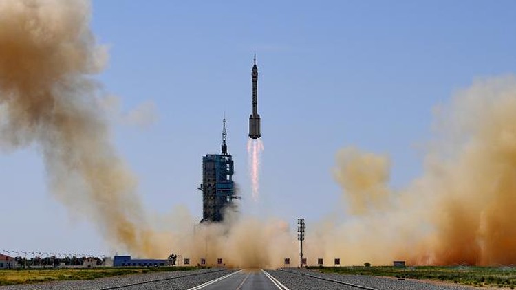 JIUQUAN, CHINA - JUNE 05: (L - R) Astronauts Cai Xuzhe, Liu Yang and Chen Dong of the Shenzhou XIV manned space mission attend a see-off ceremony at the Jiuquan Satellite Launch Center on June 5, 2022 in Jiuquan, Gansu Province of China. (Photo by VCG/VCG via Getty Images)