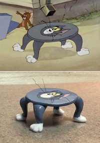 fototinet patung tom and jerry