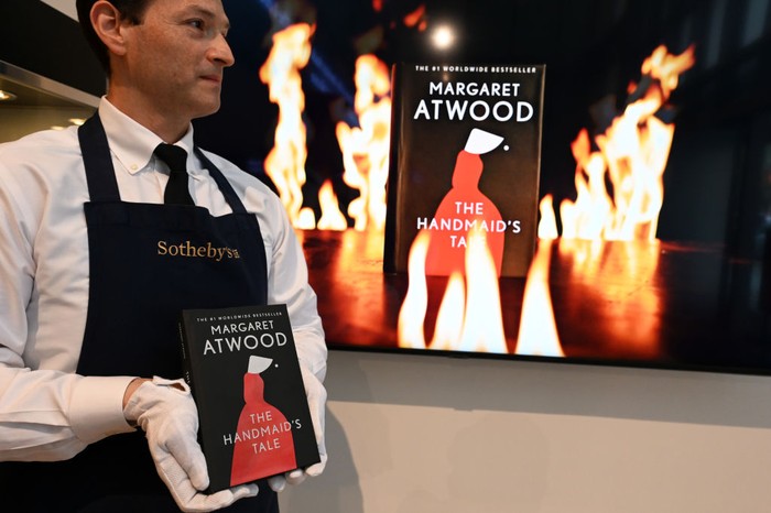 NEW YORK, NEW YORK - JUNE 03: A view of the Margaret Atwood's unique single-copy “Unburnable” special edition of The Handmaid’s Tale at Sotheby's on June 03, 2022 in New York City. In order to raise awareness about the proliferating book banning and educational gag orders in American schools nationwide, and to raise money to support PEN America’s crucial work to counter this national crisis of censorship, Margaret Atwood and Penguin Random House have partnered with the Rethink to make The Unburnable Book, a fireproof edition of Atwood’s often banned book. The book is on offer with an estimate of $50/100,000 in an online auction open for bidding now through June 7th, and will be on public view from June 3rd - 7th. (Photo by Slaven Vlasic/Getty Images)