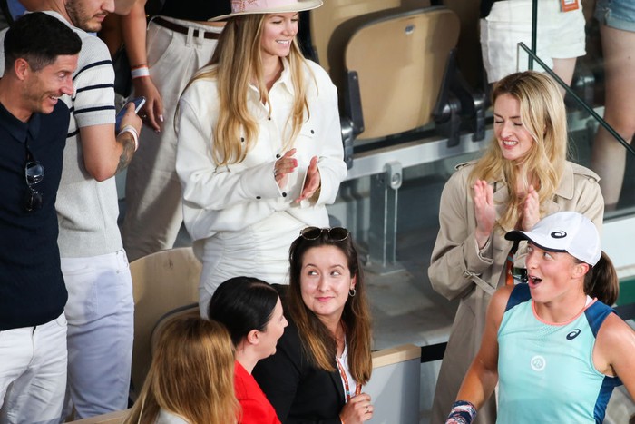 Iga Swiatek The football player Robert Lewandowski
greeting Iga Swiatek after her win against Coco Gauff on Philipe Chatrier court in the 2022 French Open women's final. (Photo by Ibrahim Ezzat/NurPhoto via Getty Images)