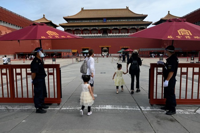 People visit the Forbidden City in Beijing on June 7, 2022, after the government eased some Covid-19 restrictions with most museums resuming in the city. (Photo by WANG Zhao / AFP) (Photo by WANG ZHAO/AFP via Getty Images)