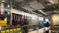 Area bersantapnya memiliki desain industrial. Wah, penggemar McD wajib ke sini nih!