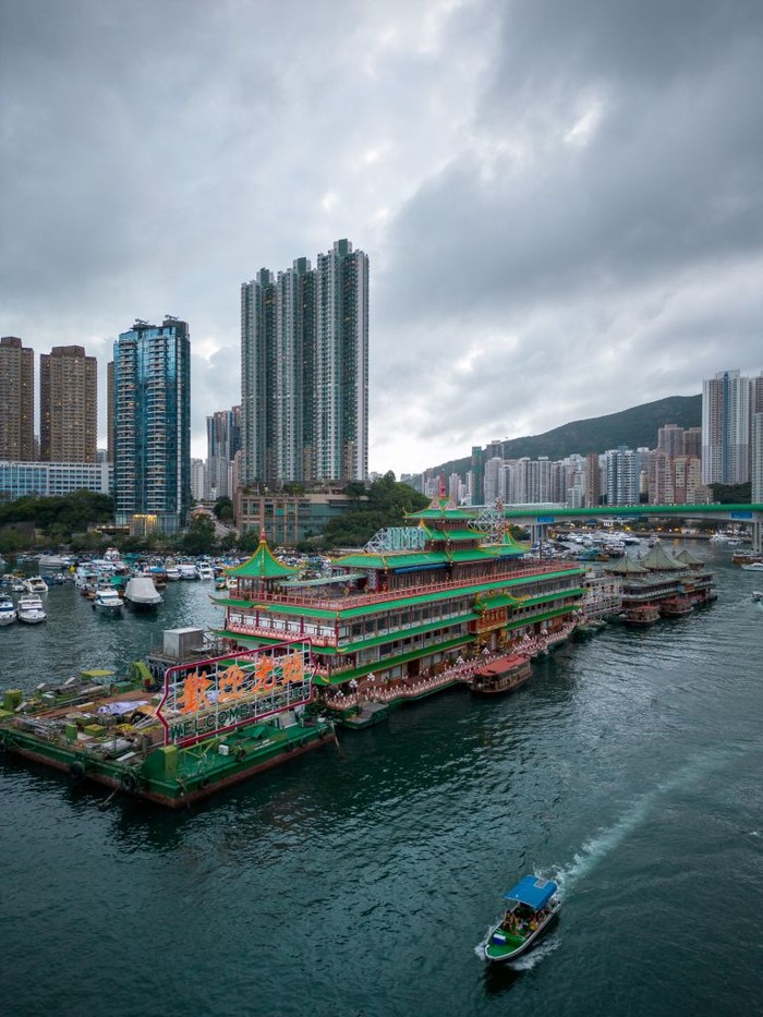 This aerial photo taken on June 2, 2022 shows the Jumbo Floating Restaurant located in the typhoon shelter near Aberdeen on the south side of Hong Kong island. - Local newspapers have reported the restaurant, which has been closed due to Covid-19 and lack of tourists since 2020, will exit the city after its owner suffered extensive losses. (Photo by Daniel SUEN / AFP) (Photo by DANIEL SUEN/AFP via Getty Images)