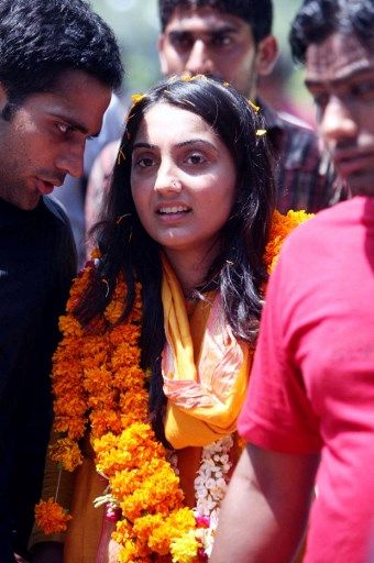 This picture taken on September 6, 2008, shows the then student leader Nupur Sharma (C) celebrating her win in students election in New Delhi. - Comments by Bharatiya Janata Party spokeswoman Nupur Sharma last week on May 26, 2022, describing the prophet Mohammed's relationship with his youngest wife have sparked furore among Muslims. (Photo by AFP)