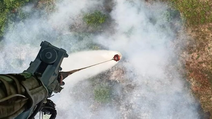 Pemadaman kebakaran lahan di Riau beberapa waktu lalu. Istimewa