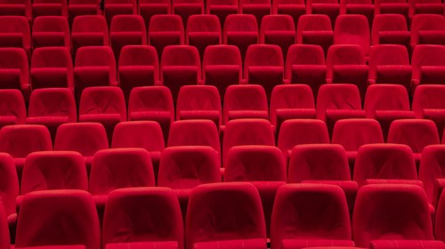 Cinema theater with Red Seats. Red and empty theater seats in a row