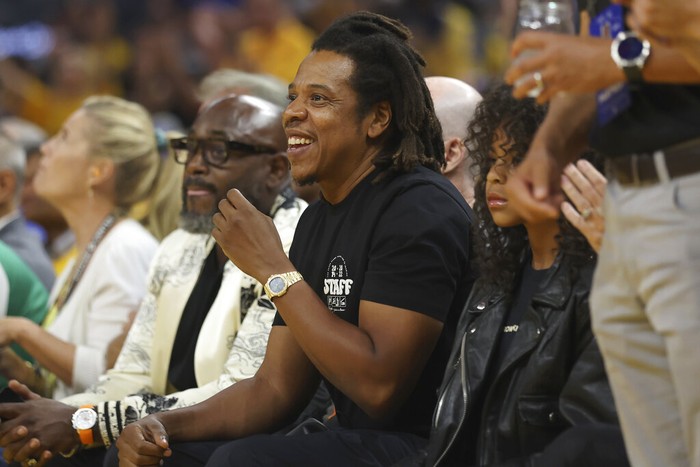 Jay-Z watches during the first half of Game 5 of basketballs NBA Finals between the Golden State Warriors and the Boston Celtics in San Francisco, Monday, June 13, 2022. (AP Photo/Jed Jacobsohn)