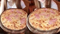 Meski tubuhnya ramping dan terbilang seksi, Alice tidak pernah membatasi asupan makannya. Ia mampu menghabiskan satu loyang besar pizza dalam waktu singkat. Foto: Instagram @alicebambam
