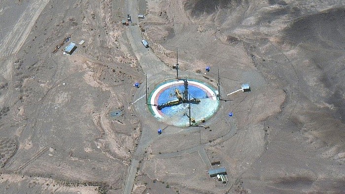 This satellite image from Maxar Technologies shows a rocket preparing to be erected at a launch pad at Imam Khomeini Space Center southeast of Semnan, Iran on Tuesday, June 14, 2022.  Iran appeared to be readying for a space launch Tuesday as satellite images showed a rocket on a rural desert launch pad, just as tensions remain high over Tehrans nuclear program.  The images from Maxar Technologies showed a launch pad at Imam Khomeini Spaceport in Iran’s rural Semnan province, the site of frequent recent failed attempts to put a satellite into orbit.  (Satellite image ©2022 Maxar Technologies via AP)