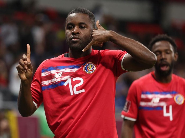 DOHA, QATAR - JUNE 14: Joel Campbell of Costa Rica celebrates after scoring a goal to make it 1-0 in the 2022 FIFA World Cup Playoff match between Costa Rica and New Zealand at Ahmad Bin Ali Stadium on June 14, 2022 in Doha, Qatar. (Photo by Matthew Ashton - AMA/Getty Images)