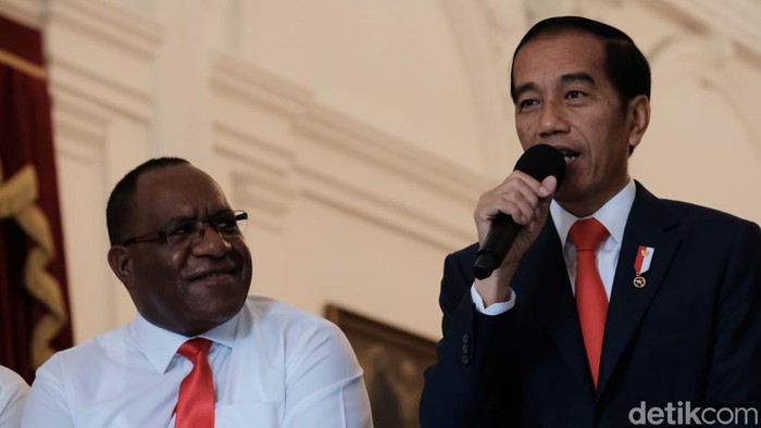 John Wempi Wetipo bersama Presiden Jokowi