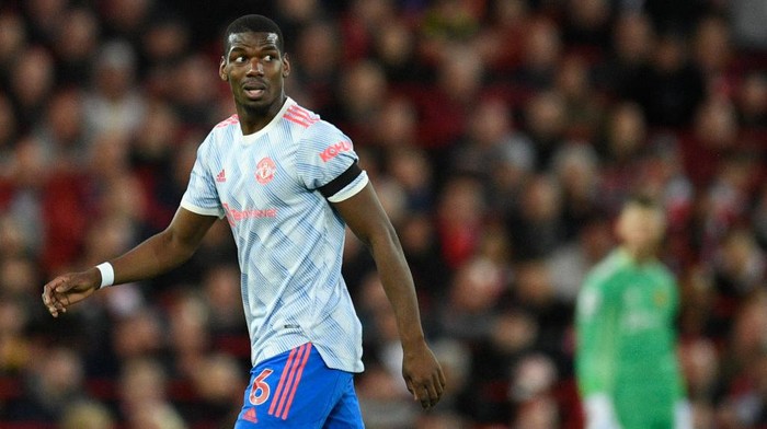 Manchester Uniteds French midfielder Paul Pogba reacts during the English Premier League football match between Liverpool and Manchester United at Anfield in Liverpool, north west England on April 19, 2022. - - RESTRICTED TO EDITORIAL USE. No use with unauthorized audio, video, data, fixture lists, club/league logos or live services. Online in-match use limited to 120 images. An additional 40 images may be used in extra time. No video emulation. Social media in-match use limited to 120 images. An additional 40 images may be used in extra time. No use in betting publications, games or single club/league/player publications. (Photo by Oli SCARFF / AFP) / RESTRICTED TO EDITORIAL USE. No use with unauthorized audio, video, data, fixture lists, club/league logos or live services. Online in-match use limited to 120 images. An additional 40 images may be used in extra time. No video emulation. Social media in-match use limited to 120 images. An additional 40 images may be used in extra time. No use in betting publications, games or single club/league/player publications. / RESTRICTED TO EDITORIAL USE. No use with unauthorized audio, video, data, fixture lists, club/league logos or live services. Online in-match use limited to 120 images. An additional 40 images may be used in extra time. No video emulation. Social media in-match use limited to 120 images. An additional 40 images may be used in extra time. No use in betting publications, games or single club/league/player publications. (Photo by OLI SCARFF/AFP via Getty Images)