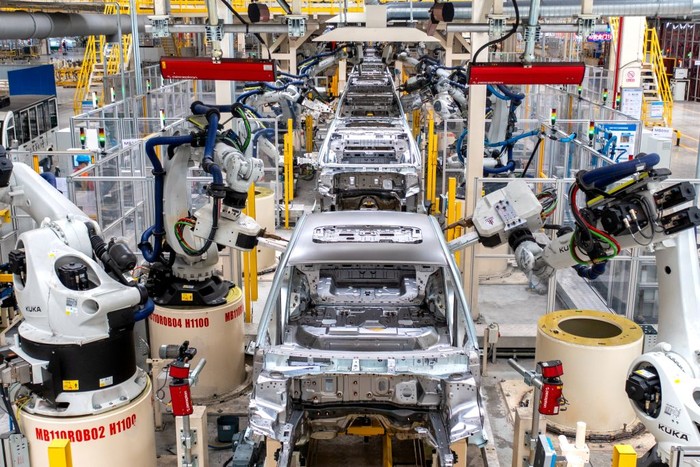 CHANGXING, CHINA - MAY 20: Employees work on the assembly line of Binray (Binrui) Cool sedan at Geely Autos Changxing Plant on May 20, 2022 in Changxing County, Huzhou City, Zhejiang Province of China. (Photo by Tan Yunfeng/VCG via Getty Images)