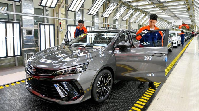 CHANGXING, CHINA - MAY 20: Employees work on the assembly line of Binray (Binrui) Cool sedan at Geely Auto's Changxing Plant on May 20, 2022 in Changxing County, Huzhou City, Zhejiang Province of China. (Photo by Tan Yunfeng/VCG via Getty Images)