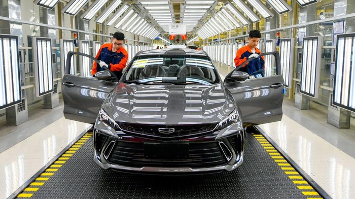 CHANGXING, CHINA - MAY 20: Employees work on the assembly line of Binray (Binrui) Cool sedan at Geely Auto's Changxing Plant on May 20, 2022 in Changxing County, Huzhou City, Zhejiang Province of China. (Photo by Tan Yunfeng/VCG via Getty Images)
