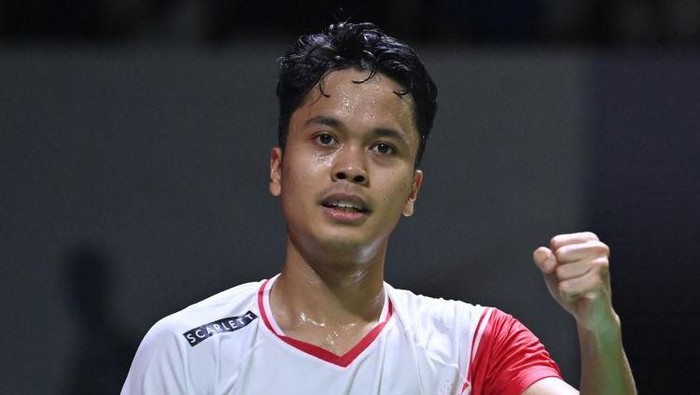 Anthony Sinisuka Ginting of Indonesia reacts after winning against Lee Zii Jia of Malaysia during the mens singles quarter-finals at Indonesia Masters badminton tournament in Jakarta on June 10, 2022. (Photo by ADEK BERRY / AFP) (Photo by ADEK BERRY/AFP via Getty Images)